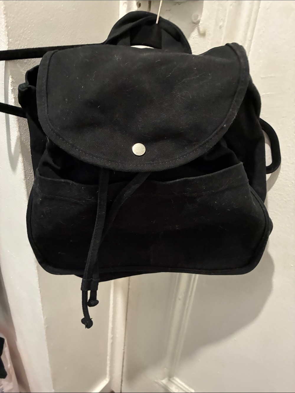 Baggu drawstring  backpack 2 outer lg  pockets. Holds a lot, light, durable. New